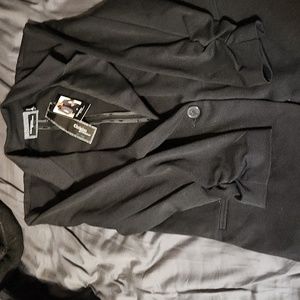 Ladies blazer size medium black in color.